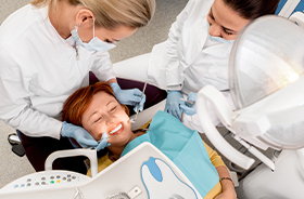 Dental team takes care of patient