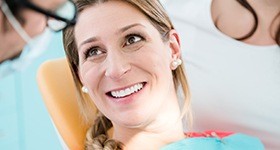 Smiling woman in dental chair