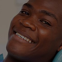 Smiling man in dental chair