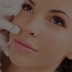 Woman receiving Juvederm injections